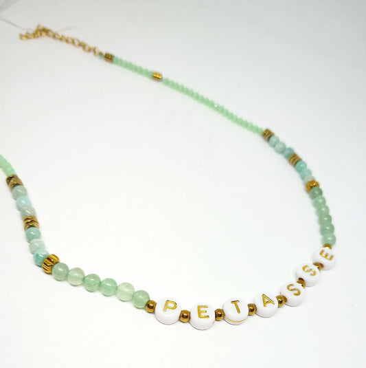 collier court message "pétasse"